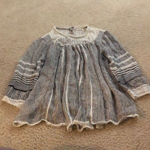 Sheer flowy, lacie neckline blouse.